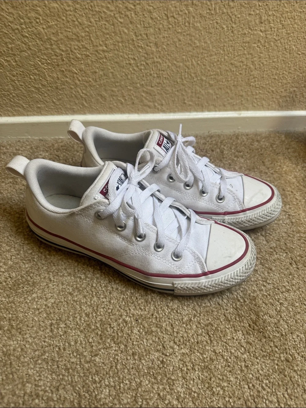 Converse Women’s Low Top Sneakers in White with Red Trim